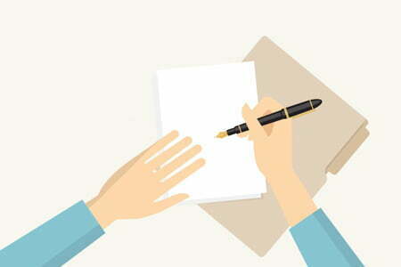 Person writing on piece of paper | HQCA