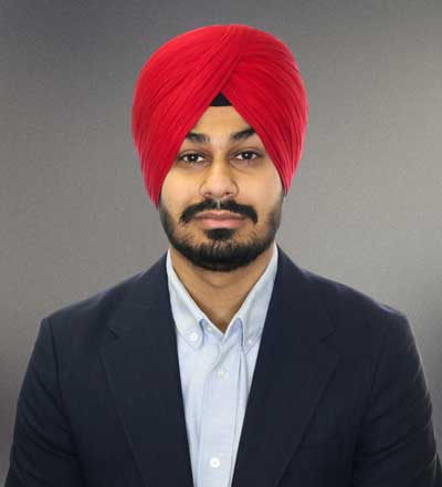 Ishmeet looking somber right into the camera.